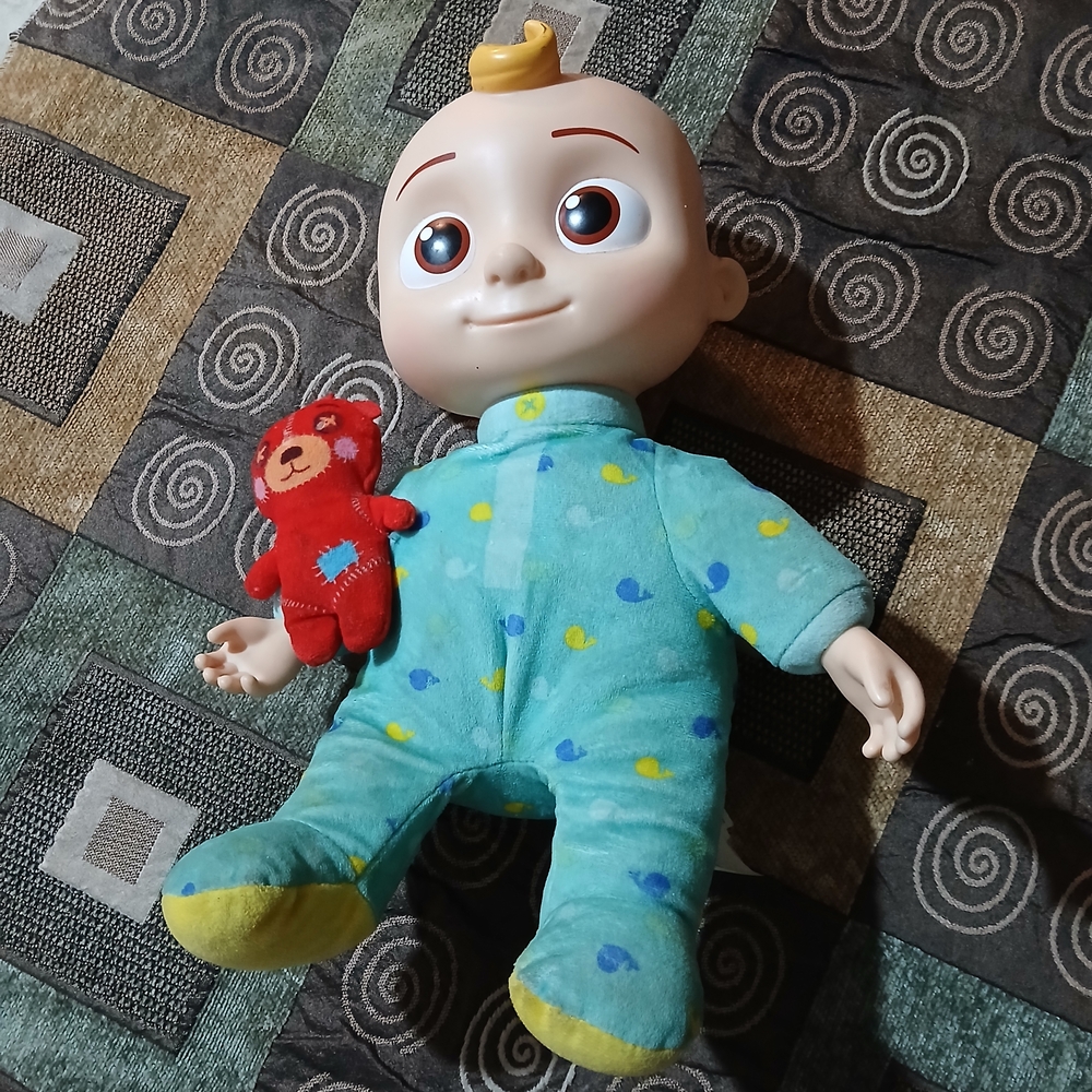 Blue and Yellow Kids Toy Doll